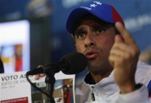 Venezuela's opposition leader Capriles speaks during a news conference in Caracas