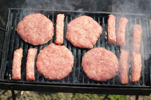 Raw Meat On A Barbecue Grill