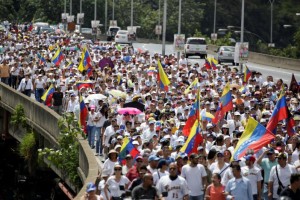 Opposition supporters take part in a rally to demand a referendum to remove Venezuela's President Nicolas Maduro in Caracas