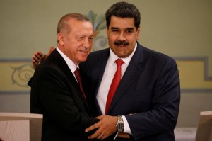 Turkish President Tayyip Erdogan and Venezuela's President Nicolas Maduro attend a news conference in Caracas